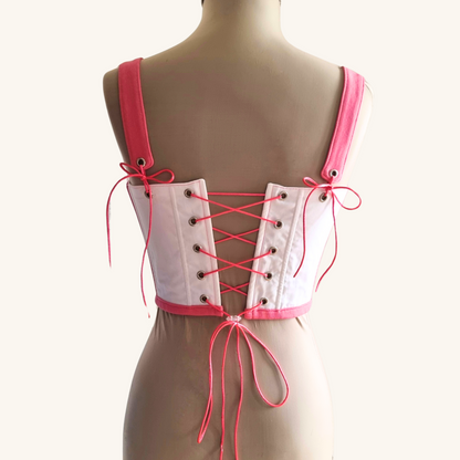 korset na maneken gledka otzad ruchno izraboten sporten v rozovo i bqlo s rozovi pandelki ot recikliran pamuk sas stoper