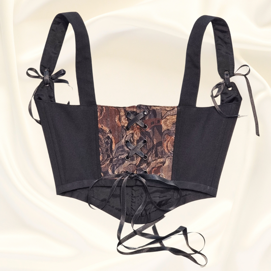 korset pod busta gledka otzad na satenen fon ruchno izraboten ot retro elek i recikliran cheren pamuk s cherni sateneni pandelki i nikelirani  metalni kapsi